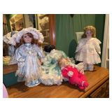 Grouping of (3) vintage porcelain dolls and (1) china head doll….all have soft bodies