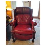 Bradington-Young maroon/red leather manual recliner with ball & claw front feet...33 1/2w x 20 deep x 42 tall...does show wear but lots of life left