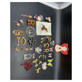 Vast assortment of vintage and modern brooches