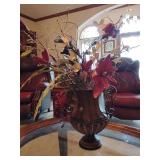Very nice metal urn style home decor with artificial florals...urn measures 11-1/2" tall