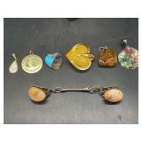 Grouping of beautiful pendants and (1) sweater clip