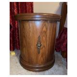 MCM drum-style nightstand with intricately carved top, glass overlay and bottom storage….18”D x 20” tall