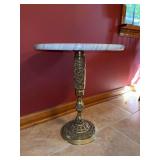Decorative brass base plant stand with gray/white marble top…..15”D x 17” tall