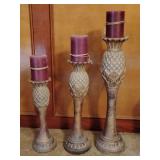 Grouping of 3 various size decorative candle sticks....22, 18, 14"