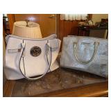 (2) Michael Kors knock-off bags…..neither have serial number tags for authenticity