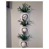 Set of (3) ceramic hat wall planters with artificial greenery…..each is 7-1/2w x 7-1/2 tall