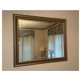 Beveled glass mirror with gold gilt frame…..35 x 29