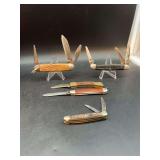 Grouping of vintage pocket knives…..all need cleaning….bottom front is Boker