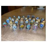 Grouping of gold and silver tone collectible thimbles