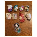 Elegant grouping of lady head brooches