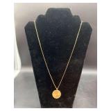 14K yellow gold 24” chain with 14K yellow gold medallion…..10 grams