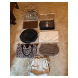 Grouping of ladies handbags in various sizes and designs