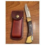 Vintage Sears 4-15/16” Lockback Knife with leather sheath and original box (95416)….box has blemish