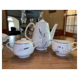 (4) accessory pieces of Easterling Ceres China with platinum rim…..teapot, creamer, lidded sugar bowl and s/p shakers (see pics)