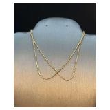 14K yellow gold double strand bracelet…..10” and 5 grams…..marked 585