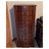 Extraordinary cherry finish jewelry chest with 2 side doors, top area with mirror and 8 drawers….18 x 12 x 40-1/2 tall