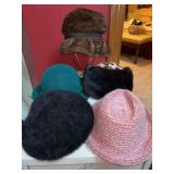 Grouping of ladies hats……no verification that any of the furs are authentic