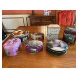 Nice selection of various design and size tins…..oval Kinkade is a candle