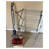 Cleaning Essentials and Clothing Rack