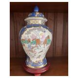Vintage Chinese porcelain temple jar with Hunt scene ￼