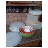 Miscellaneous Bowls and storage containers. Stackable bowls has the 3 largest lids. Largest bowl is 11.5x5.5
