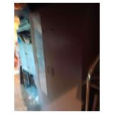 Metal 2 door cabinet..in attic. Buyer responsible for removal