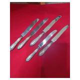 Set of 5 Sterling knives, weighted.