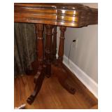 4 legged antique occasional table. Very pretty..28x28.5x30.  Does have a split on top as shown