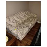 Floral Couch with wood claw feet. 86x34x39