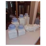 Set of 5 canisters and blue floral hippo.