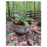Cast iron pot 21" has damage in back as shown