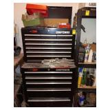 Contents only of black craftsmen toolbox.