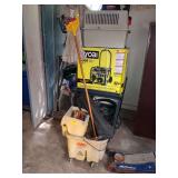 Rubbermaid mop bucket with mop and yard games.
