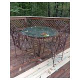 Rod Iron Table with 4 arm chairs and glass top 30 x 48.