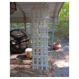 3 white house trellis. 23x82...has brackets to keep off home. 6.5"