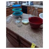 Mixture of kitchen items, refrigerator dish, milk bottle, see photos.