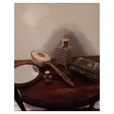 Group of dresser trinkets. The box does have some damage as shown.