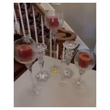 Group of crystal and glass candle holders.