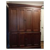 Very nice office desk..2 pieces. Has locking file cabinet and 2 pull out shelves..60x27x78 Top piece has 2 swinging doors and is 47" tall.
