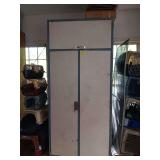 Locker with contents inside and on top. 42x95x24