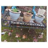 Outdoor Metal-Cast Iron Table (42x19.5x20.5) 2 pieces. 2 pieces. Top sits on metal legs. Marble piece can be removed