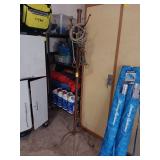 Vintage metal coat rack missing two hooks and one screw in foot