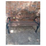 Metal bench with flowers. 51x36