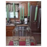 2 bottles with candleabra toppers