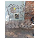 2 folding metal chairs