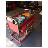 Red rolling cart with contents. 32x38x18