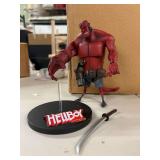Gentle Giant Hellboy action figure with sword and display stand….has protective cover but no box