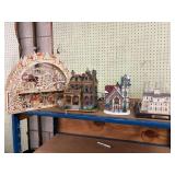 Contents of top shelf…..lighted Westminster Abbey, lighted church, lighted haunted house and balsa wood lighted Christmas display…..none are tested