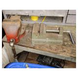 2 Vices, one loose, the other attached to workbench. Other contents not included