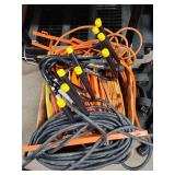 Extension Cords Heavy Duty 5, lengths unknown, 3 on rolls and 5 V-shaped HangAlls